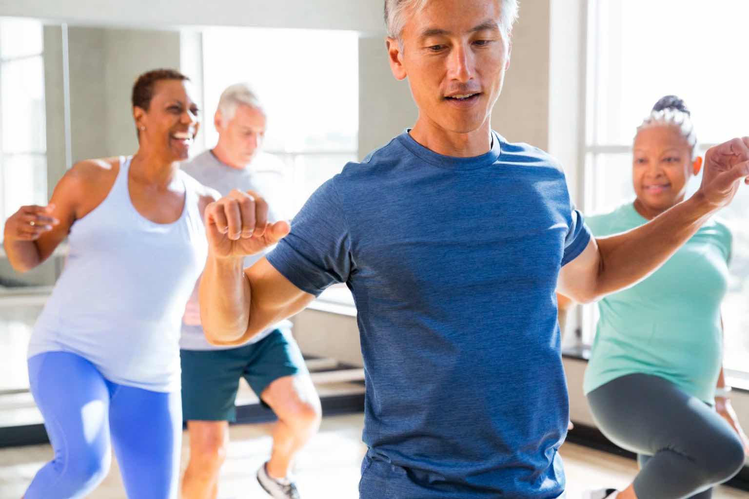 a group of parents in a fitness class