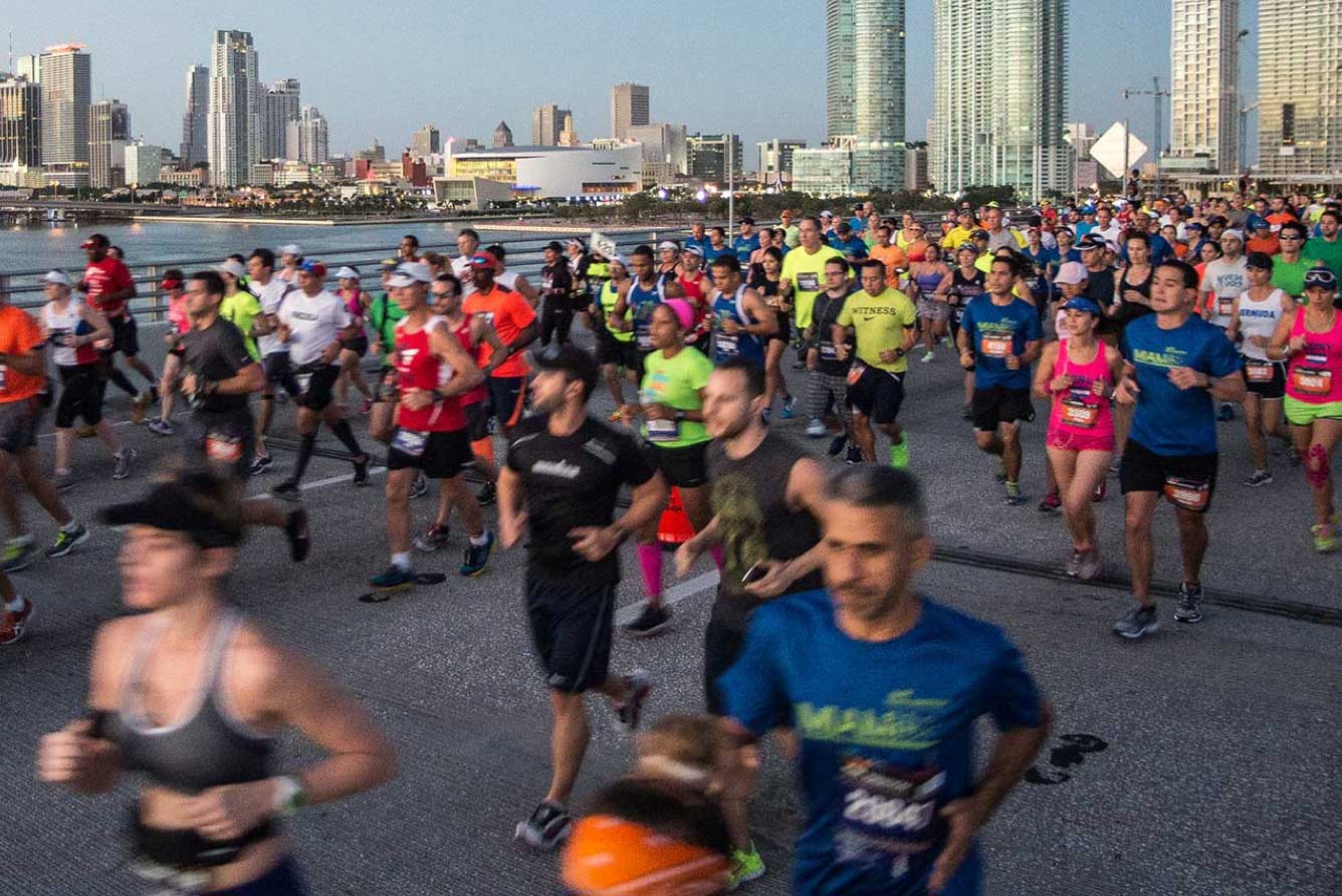 A group of people running at a Life Time outside event