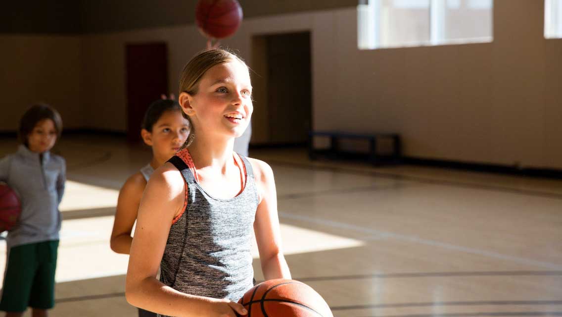 multiple kids dancing together in a studio