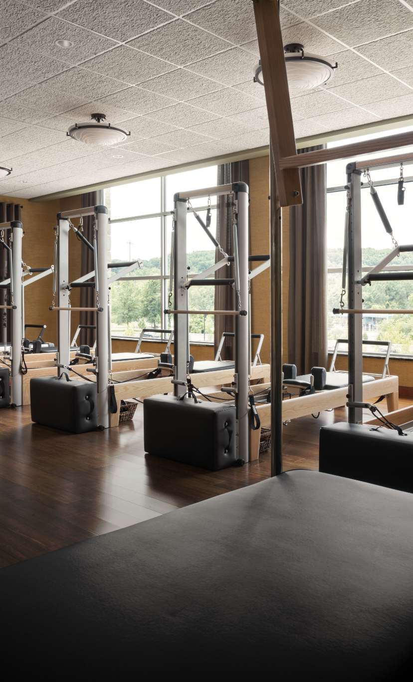 pilates reformer machines in a pilates studio