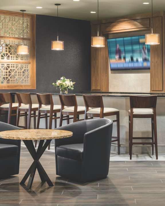 Elegant bar seating area at the LifeCafe inside Life Time