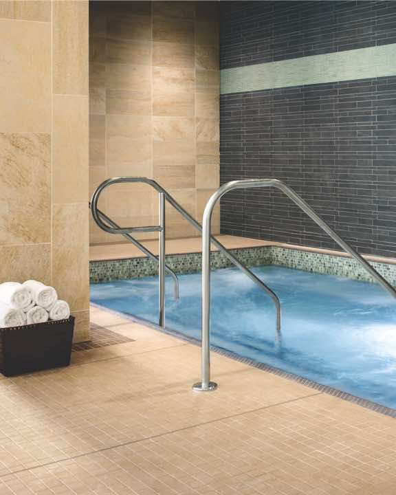 Inviting whirlpool in the locker room at Life Time