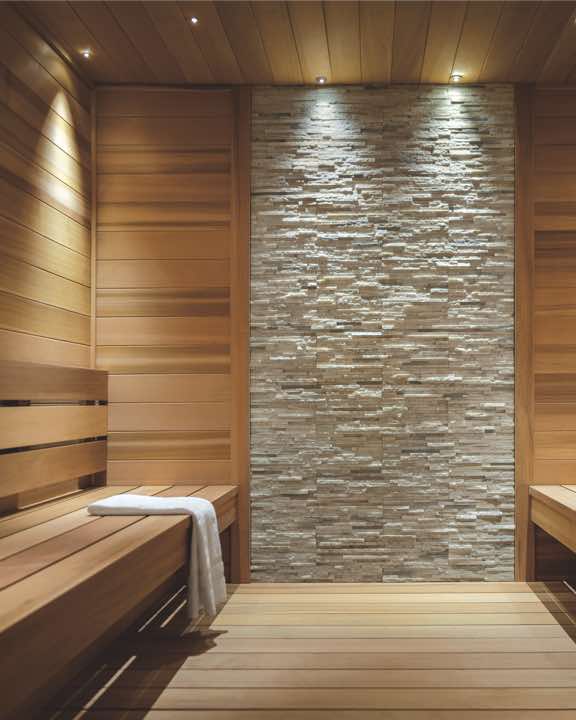Peaceful sauna space with wooden benches and walls