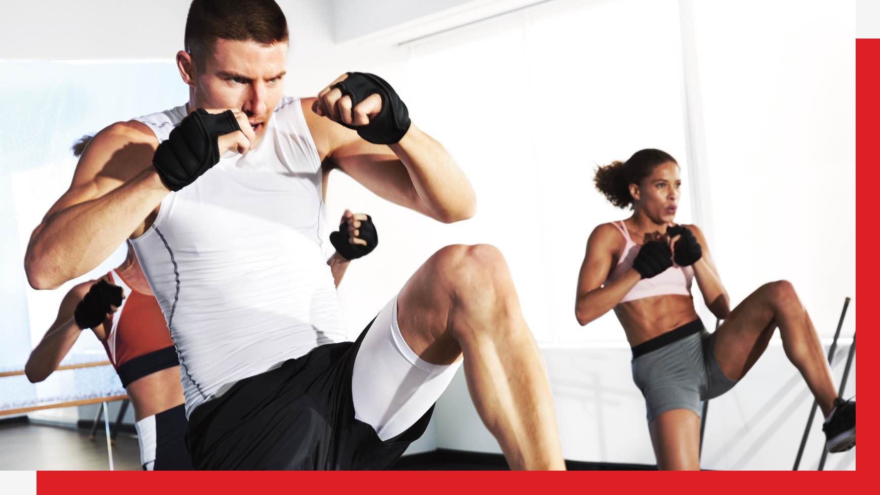 Group of people working out in a Strike class